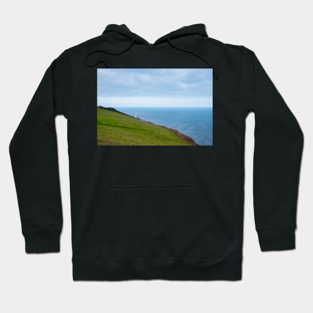 Whitby lighthouse on the Cleveland Way path Hoodie by stuartchard